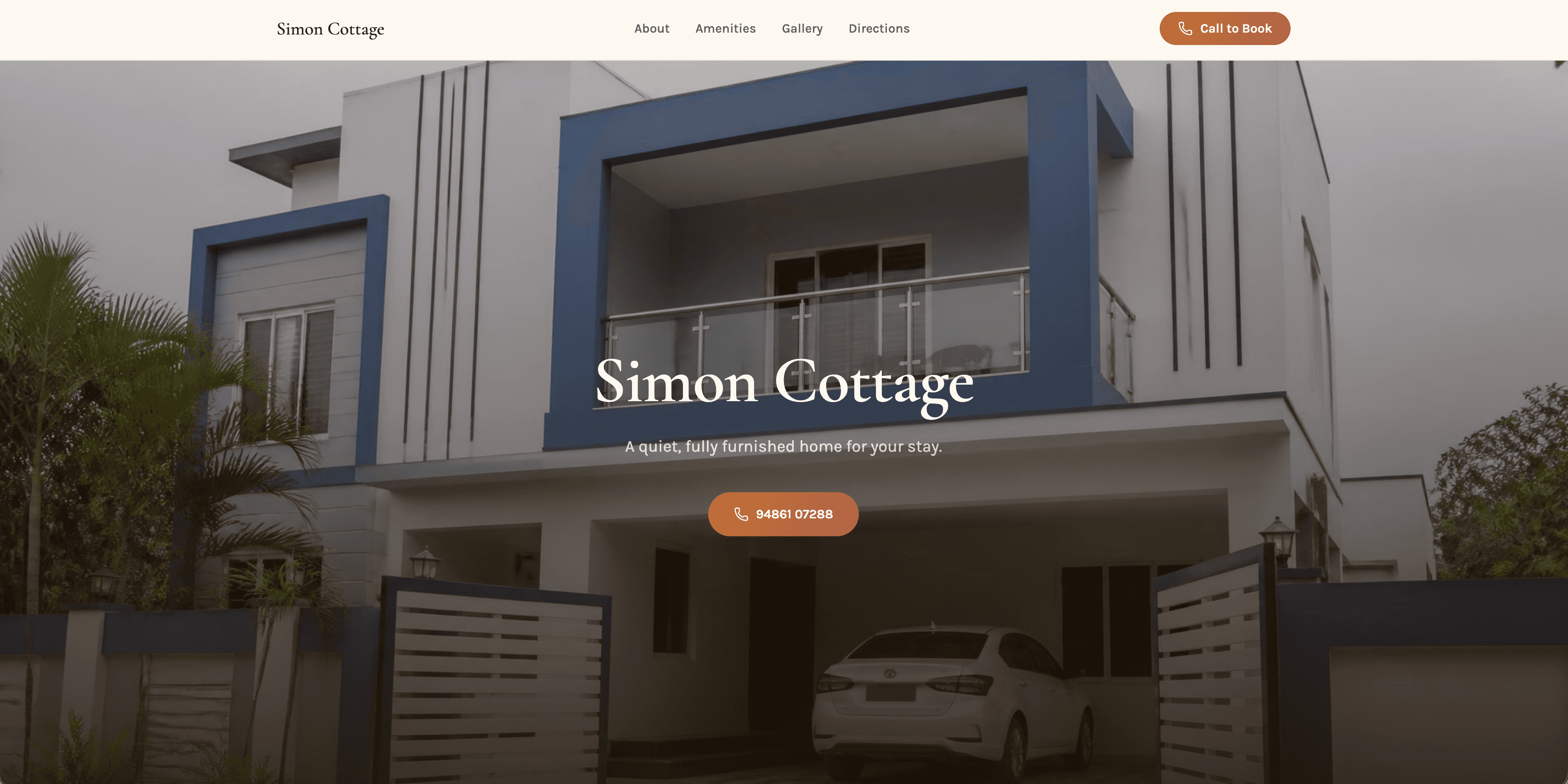 Simon Cottage front exterior with balcony and driveway